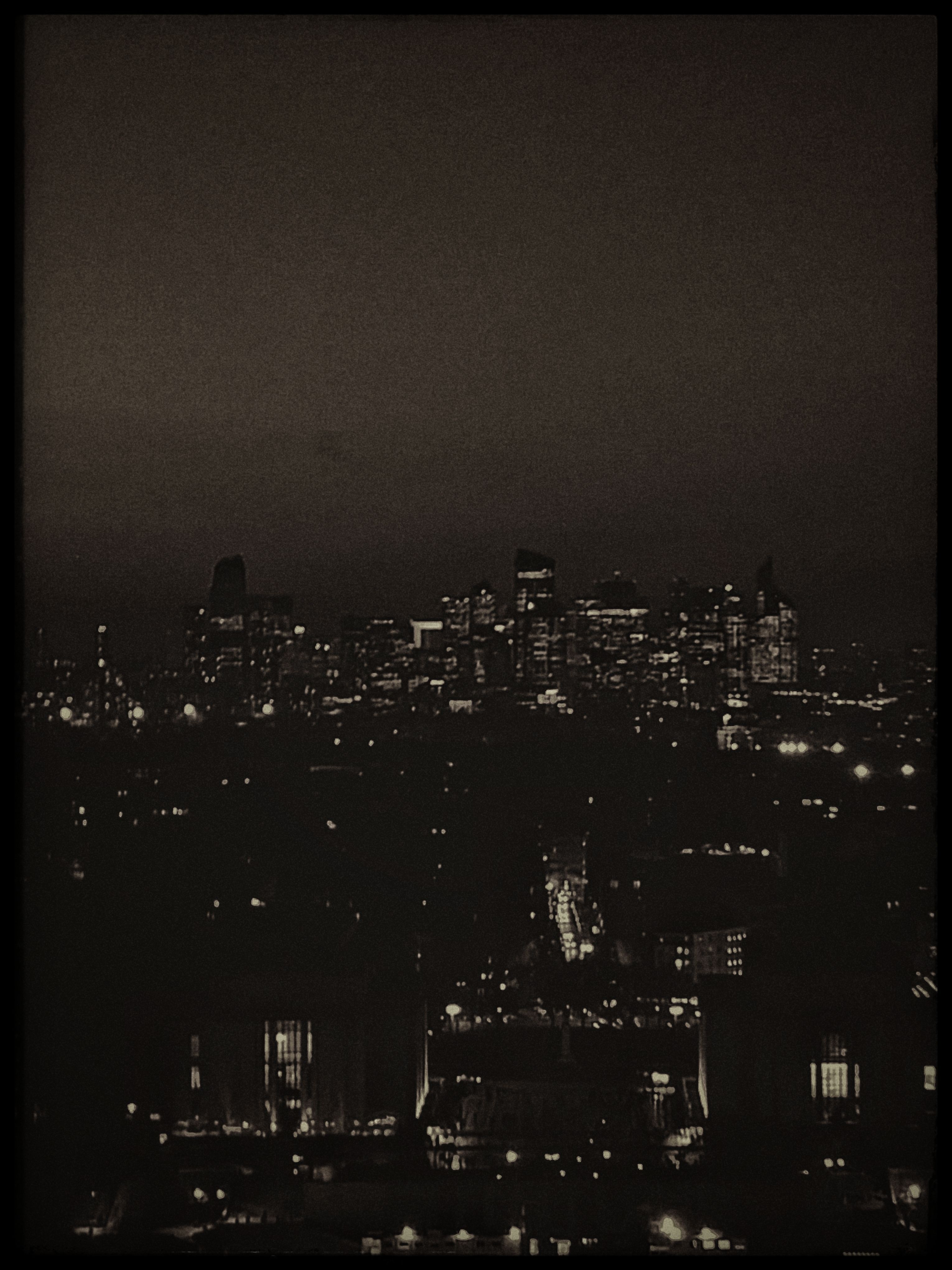 A B&W film shot of the Parisian cityscape